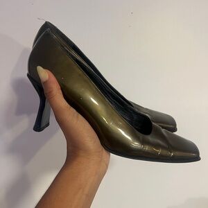 Stuart Weitzman patent leather square toe pumps in olive colorway.